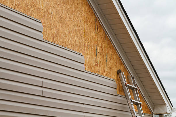Professional Siding technician working in Takoma Park, MD